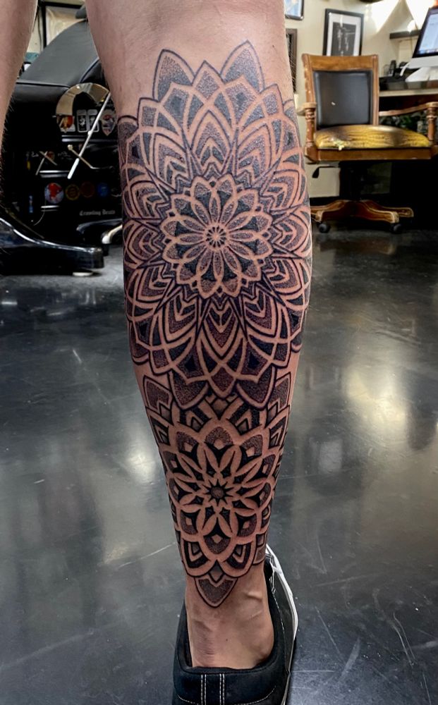 Mandala tattoo male leg geometric dotwork art 