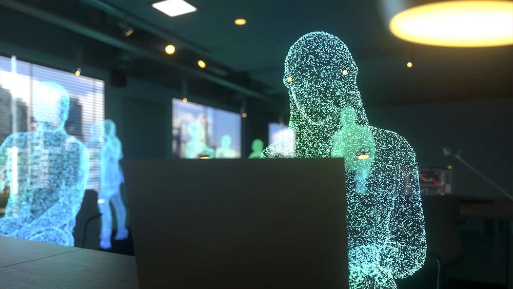 An illustration of people made of pixels sitting in front of computer screens