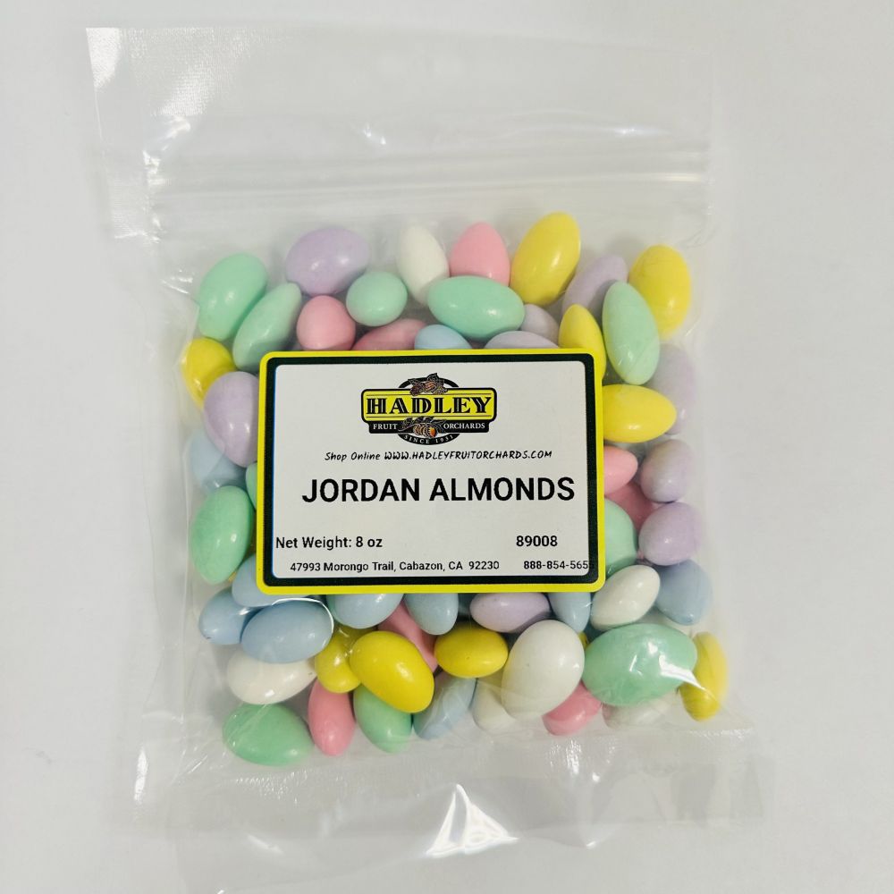 A bag of multi colored candy almonds. 