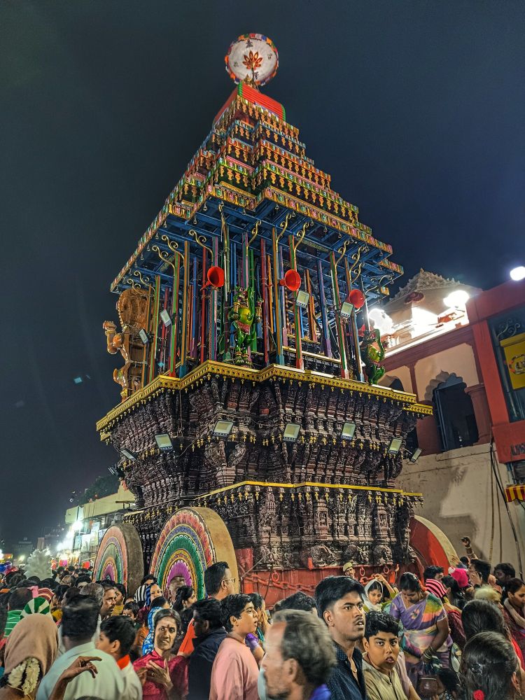 Yesterday, 1 December 2025, ‘Periya Ther,’ the enormous wooden chariot of the presiding deity of Arunachaleswar Temple was pulled in procession by hundreds of devotees around the four main streets surrounding the temple using large chains as part of the annual Karthigai Deepam festival. 

The chariot carrying the goddess, Unnamulai Amman, was similarly hauled by women, followed by the chariot of Chandikeshwarar.

The main chariot is the largest of its kind in Asia weighing 300 tons and with a height of 90 feet and was built in such a way that the lower-most tier made of teak wood is heavy and, as it goes up, it is constructed with lighter wood to ensure stability when the chariot moves.

This is a TV report from 2024:

https://youtu.be/y3iQ9uP5muI
