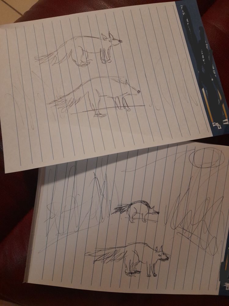 Four lineart drawing of a fox in pen on lined notepad paper. 