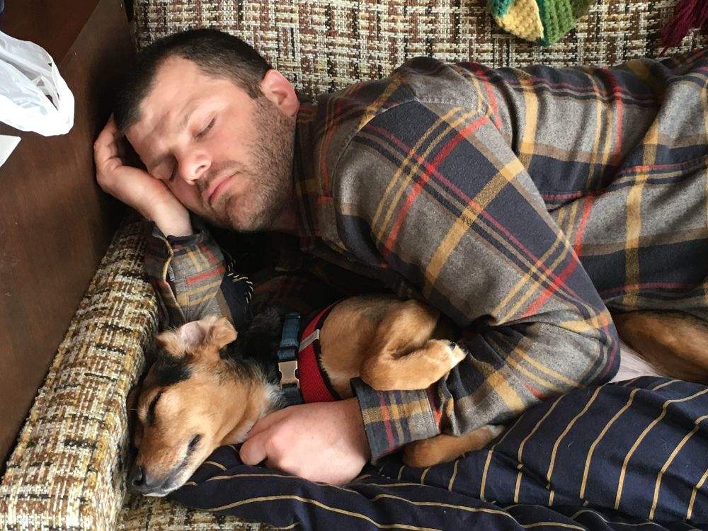 Napping with Thistle on the vintage sofa at the up north cabin.