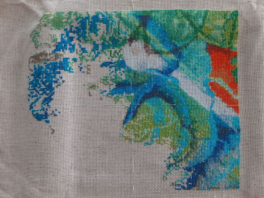 A half complete cross stitch project 