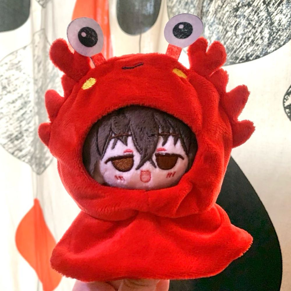 A plush doll of Osamu Dazai from Bungou Stray Dogs in a crab costume 
