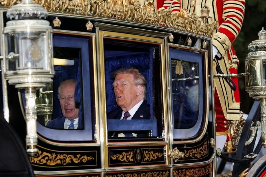 Two wealthy pricks Charles Windsor and Donald Trump is a gold carriage. Both looking like the dying embers of colonialism. 