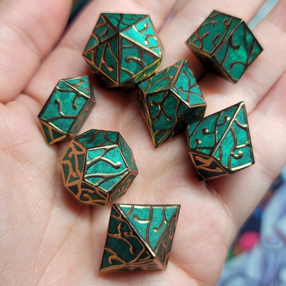 Forest Green handmade polyhedral dice blanks with handpainted gold filigree. 
