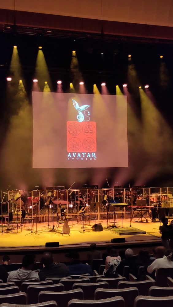 A stage set up with orchestral instruments before the Avatar: The Last Airbender live concert.