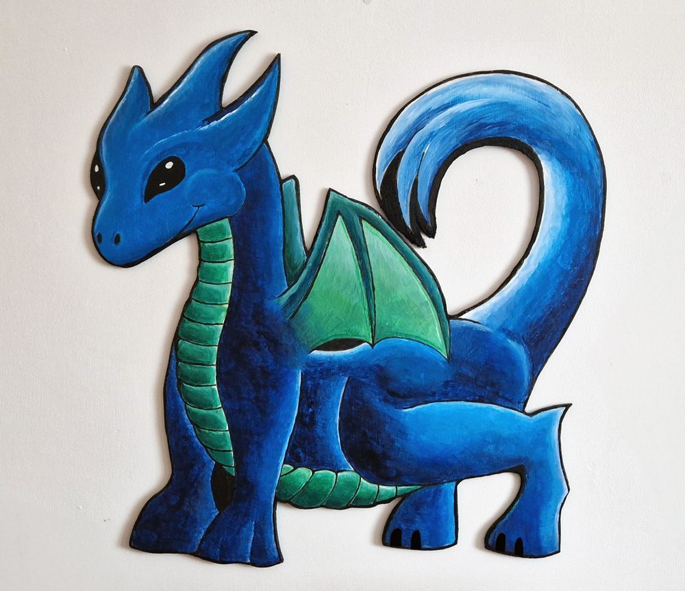 A picture of a water dragon hanging on a wall. First drawn, then painted on wood board, and finally cut out and sanded –over a while... It's about 80 x 80cm (bigger than I planned originally).