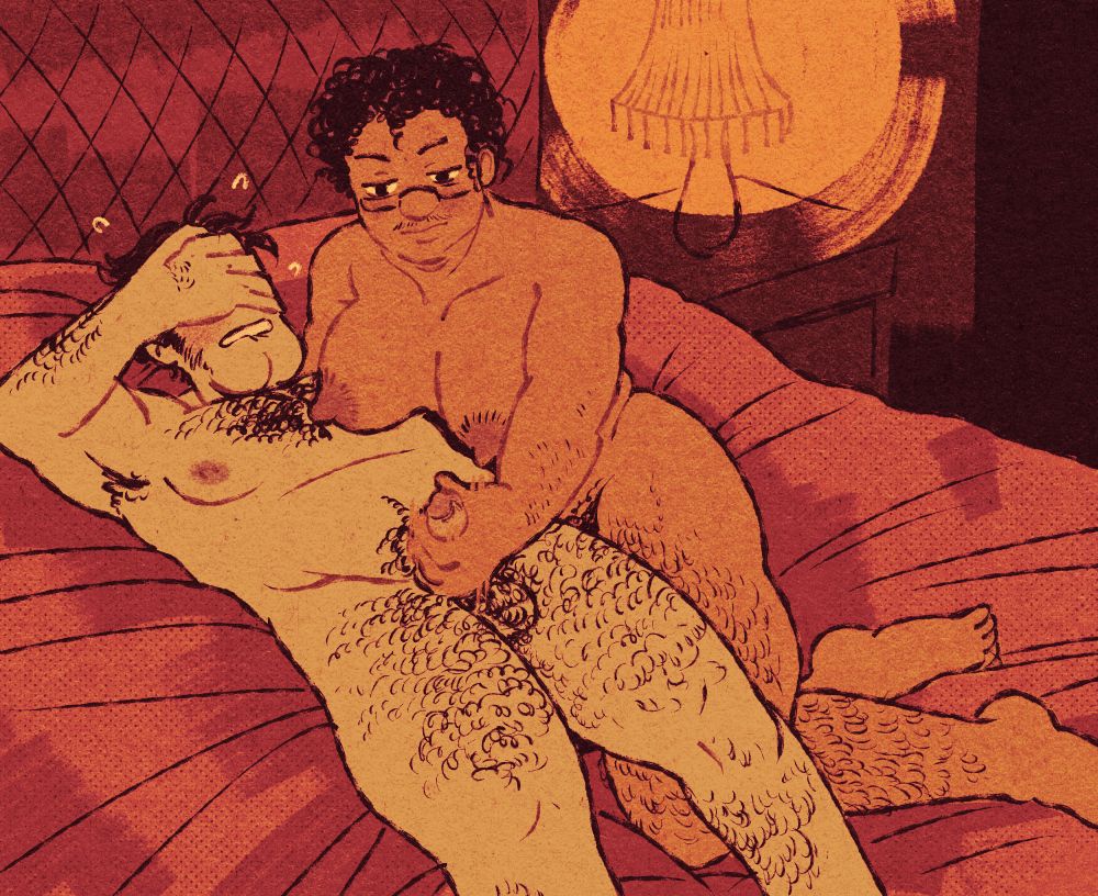 two hairy men lay in bed together, one of which is a trans man with a large chest jerking off the other