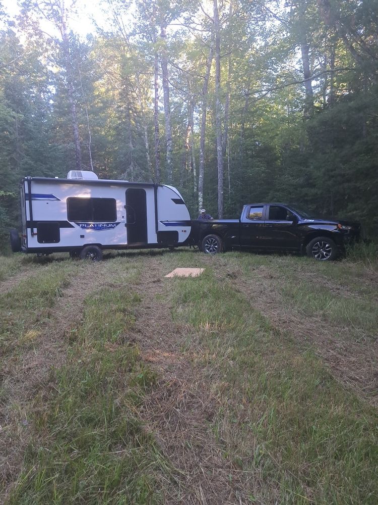 You can't see the red clay and ruts, but they're here all right! Camper's rear tire was in a hole, black Silverado is teetering on the edge of a ditch up against some trees. Youngest child calls it the Grass family way....Murphy's Law - anything that could go wrong will go wrong.....adds some spice to everyday life and everything we do. Bitchiness doesn't last long, thank goodness and we can laugh about it later. Feel sorry for the people around us who don't know us well. Lol I imagine I've lived up to my moniker today.
