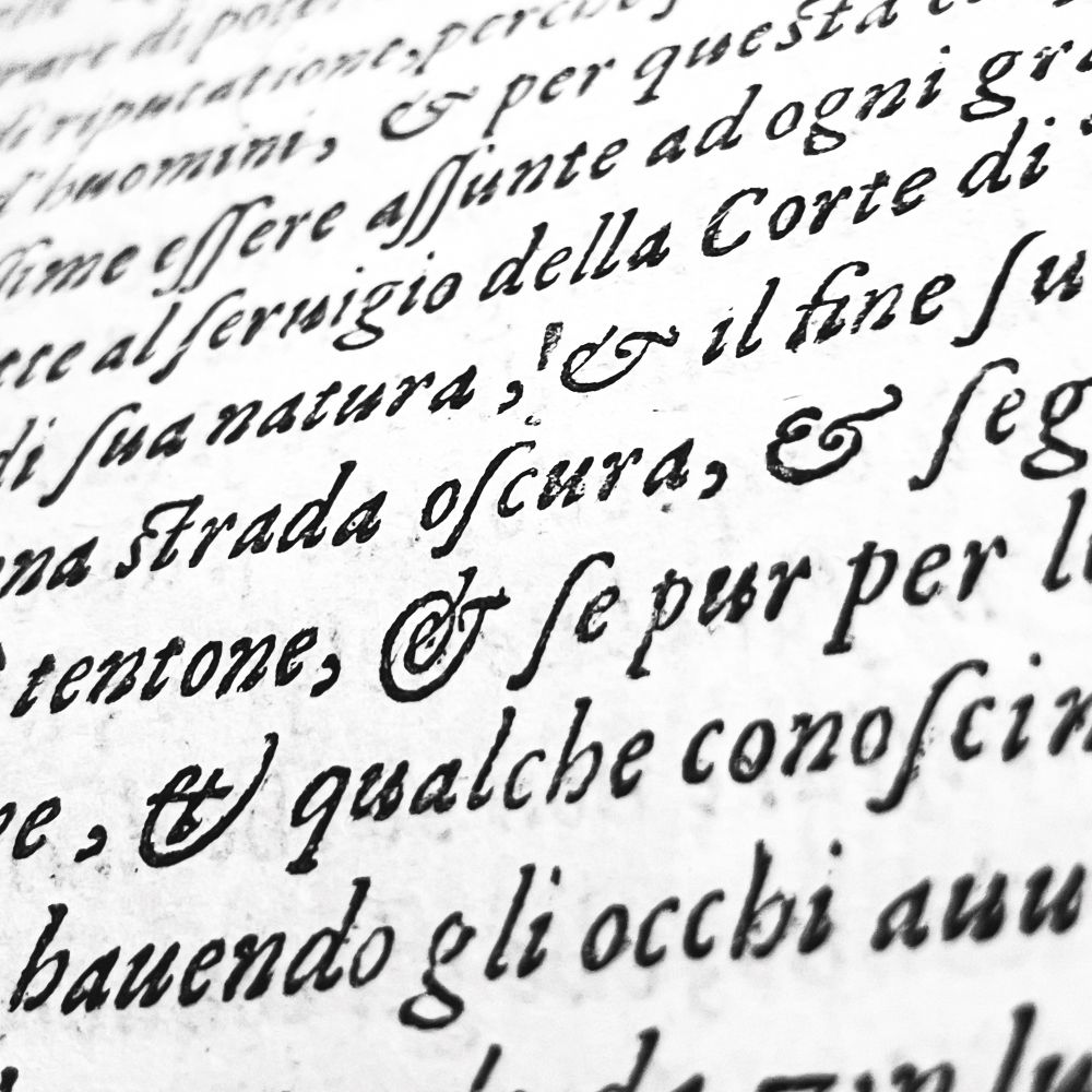 A close-up of a page (from a 17c book) printed in italic type highlighting four ampersands of varying design in close proximity to each other. 

222050 • Folger Shakespeare Library