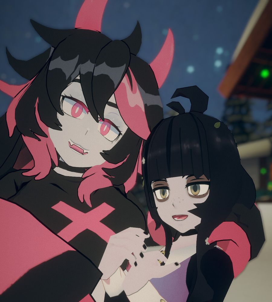 Two vtubers (andou and kimispice) stand close together, smiling. The background is a winter nighttime scene with a building and stars.