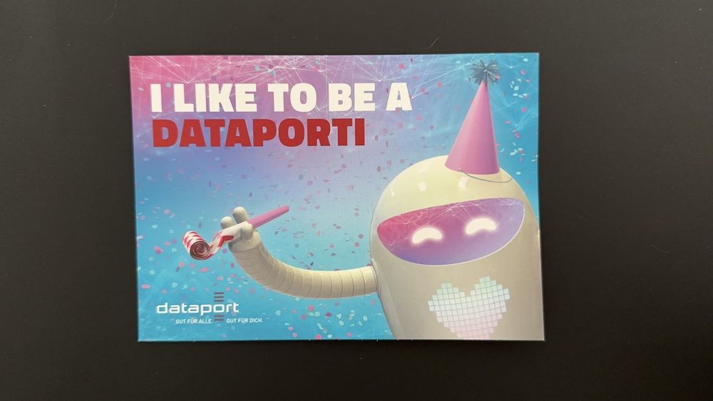 A postcard saying "I like to be a Dataporti" with the company mascot celebrating
