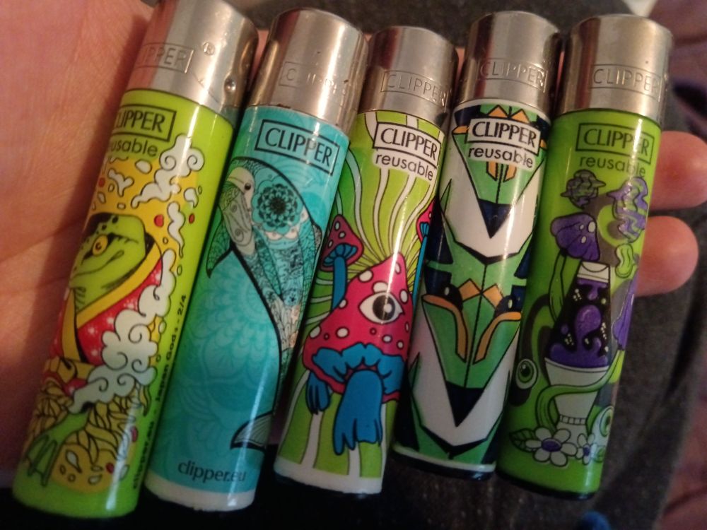 Clipper lighters with art on them