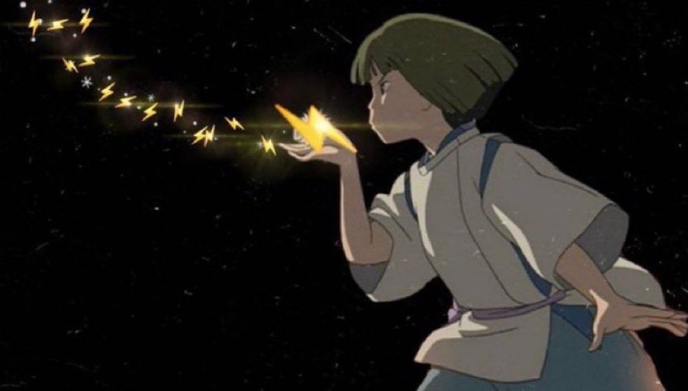 An animated character blows a glowing, magical star from their hand against a dark background.