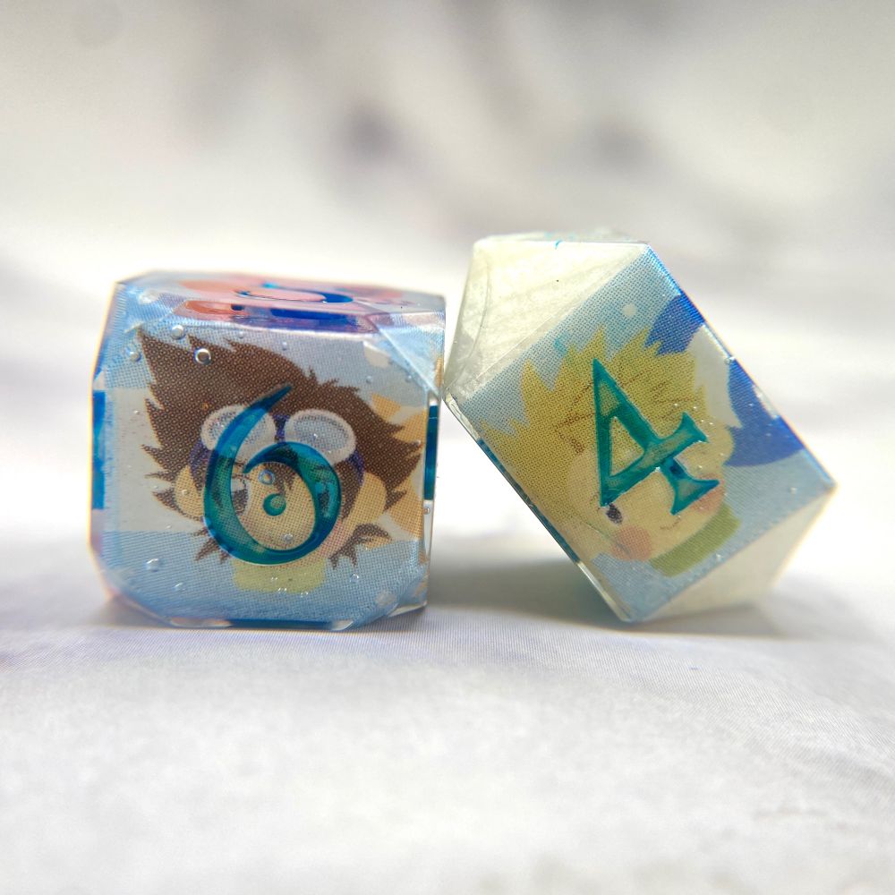D&D dice featuring the images of the original Digidestined and their partner Digimon.