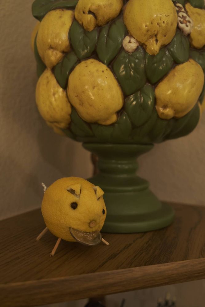 Lemon pig under a decorative lemon tree