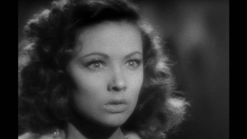 Gene Tierney looking pale and frightful, her hair a mess, and eyes wide as if she's just had an existential shock