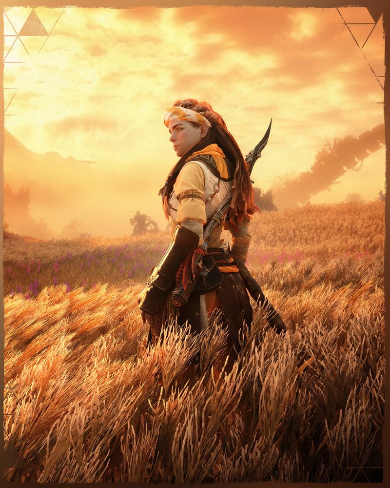 A screenshot taken in Horizon Forbidden West of Aloy standing in tall grass while looking over her shoulder.