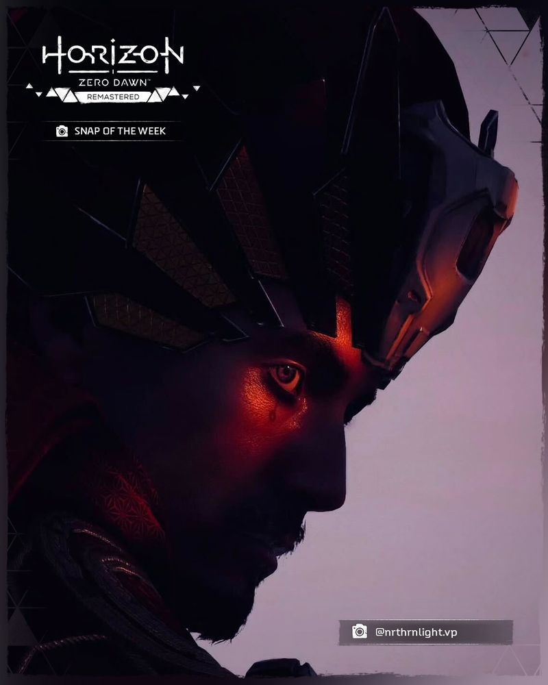 A screenshot taken in Horizon Zero Dawn Remastered of Nil in shadow, with only one side of his face in the light.