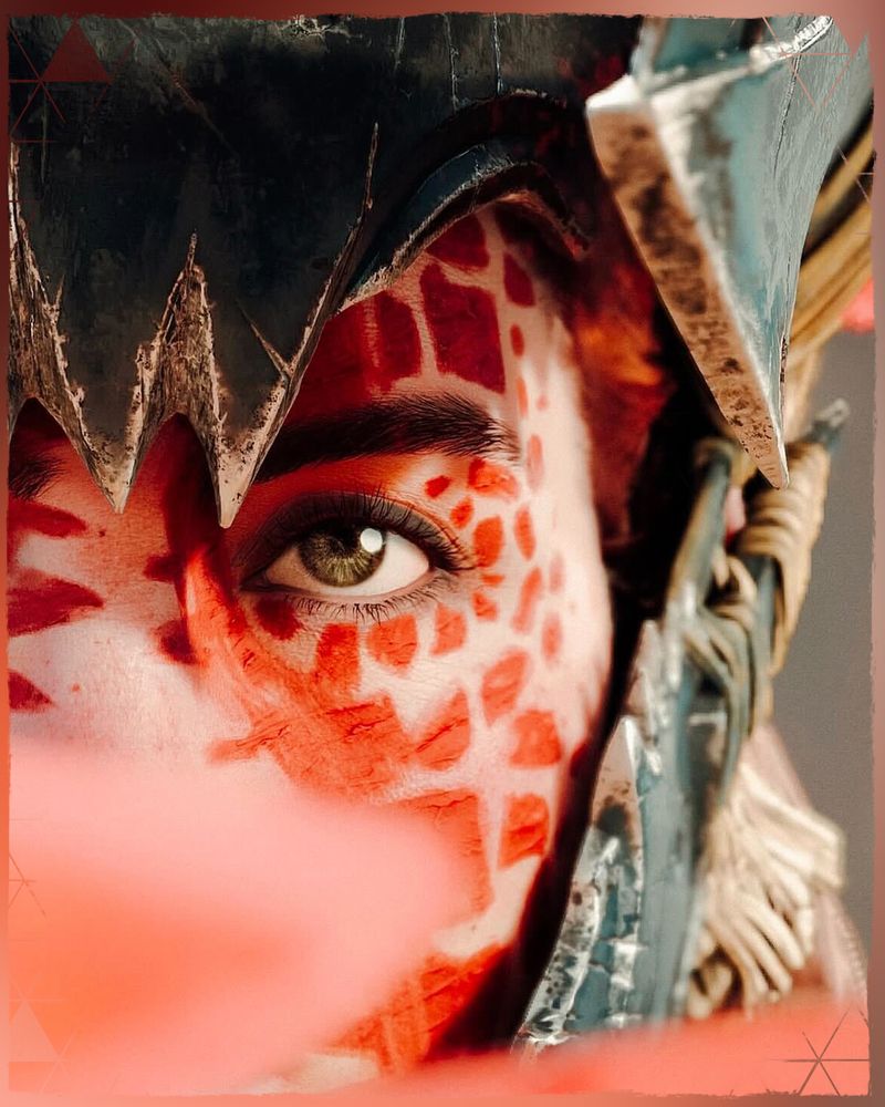 A close up screenshot taken in Horizon Forbidden West of Aloy eye, with the rest of her face covered by the Blight.