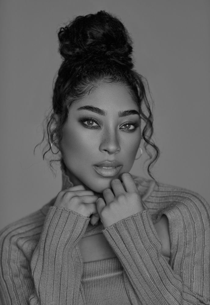 Black and white headshot of Adriyan Rae.