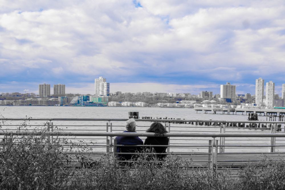 Same couple, only blue skies and the gentleman's blue jacket