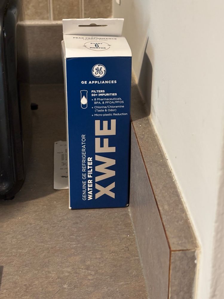 A long blue box that reads “Genuine GE Refrigerator Water Filter,” and then “XWFE” in big letters.