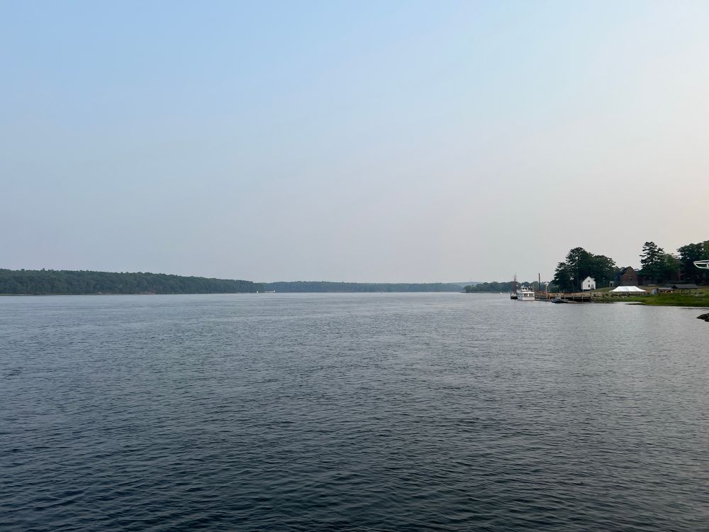 layer of wildfire smoke over the kennebec river 