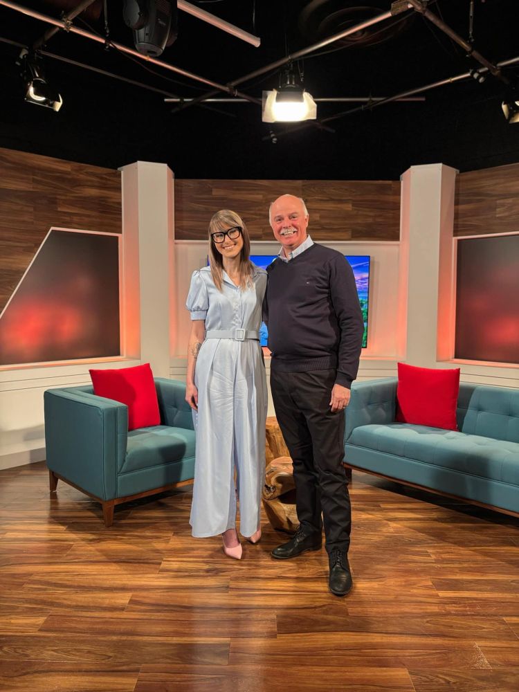 Tom Osborne with Lori-Lydia Loveless of Rogers TV