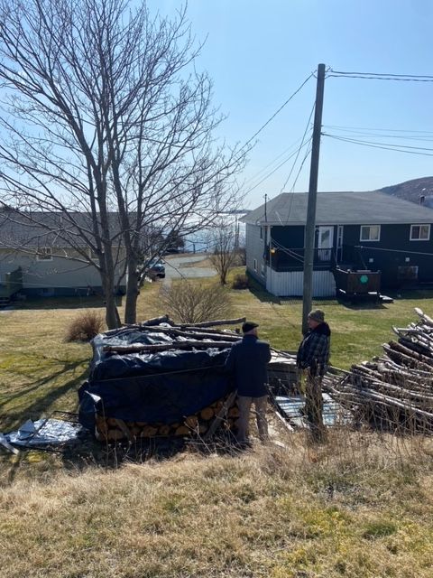 Tom Osborne in Petty Harbour-Maddox Cove speaking with residents