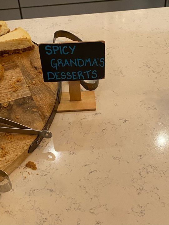 Sign at desserts that says spicy grandma desserts