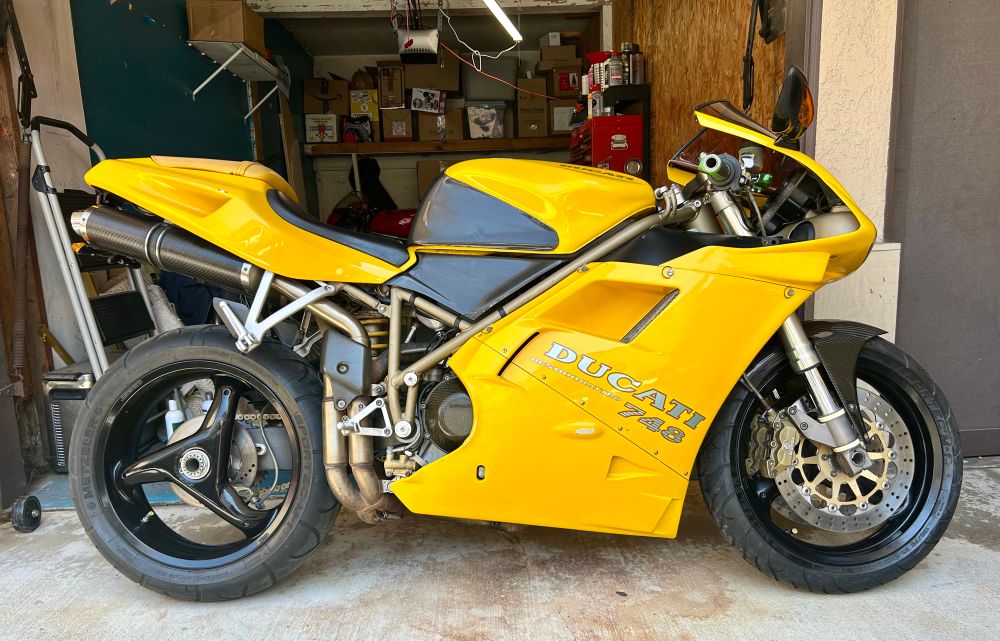 Photo of a yellow 1997 Ducati 748