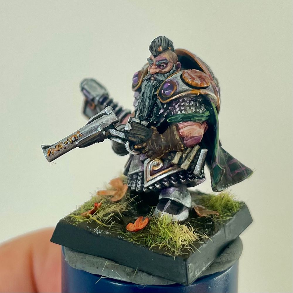 Detail showing runes on the gun barrel