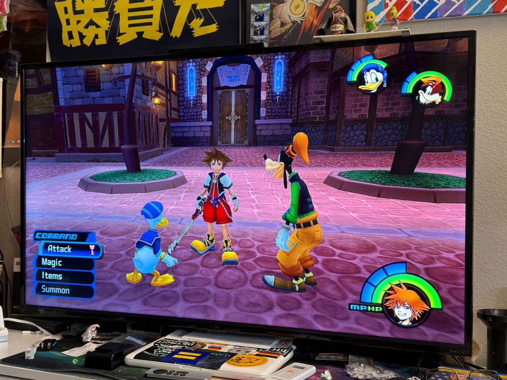 A photo of a TV with Kingdom Hearts 1.5 Final Mix being played. 

(The joke: the main character in KH is Sora, therefore I was making a shitpost about the AI video tool with the same name. AI sucks and always will.)