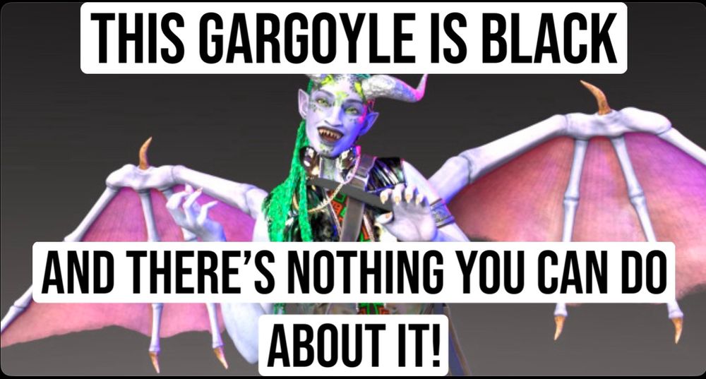Terrya, from Tears of Xivo, a female gargoyle with pale blue skin, and vibrant green braids is looking at the viewer with a wide smile. The top text of the image reads “This gargoyle is Black” the bottom text reads “and there’s nothing you can do about it!” In all caps. 