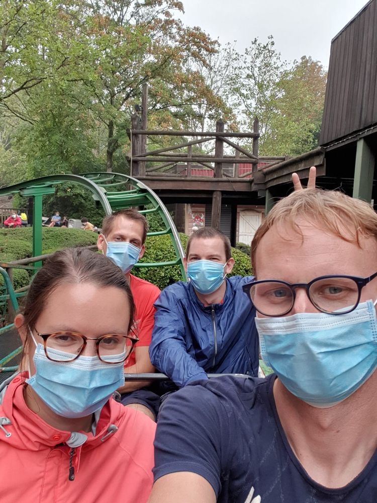 Picture on a rollercoaster theme park ride of me with 3 friends