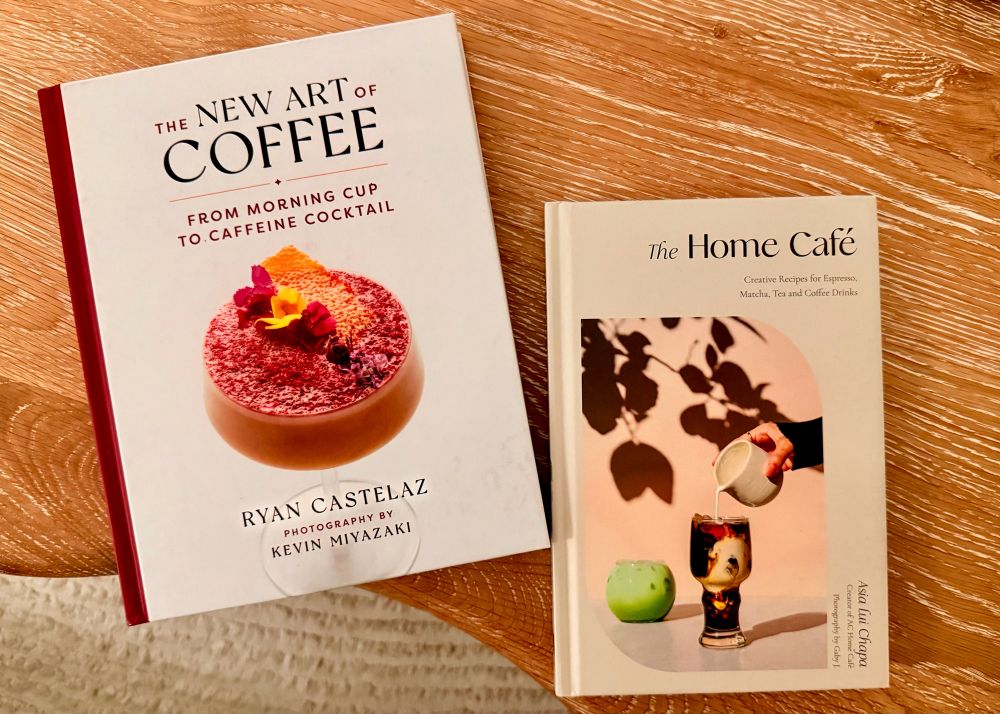 Two books on a table: The Home Café and The New Art of Coffee