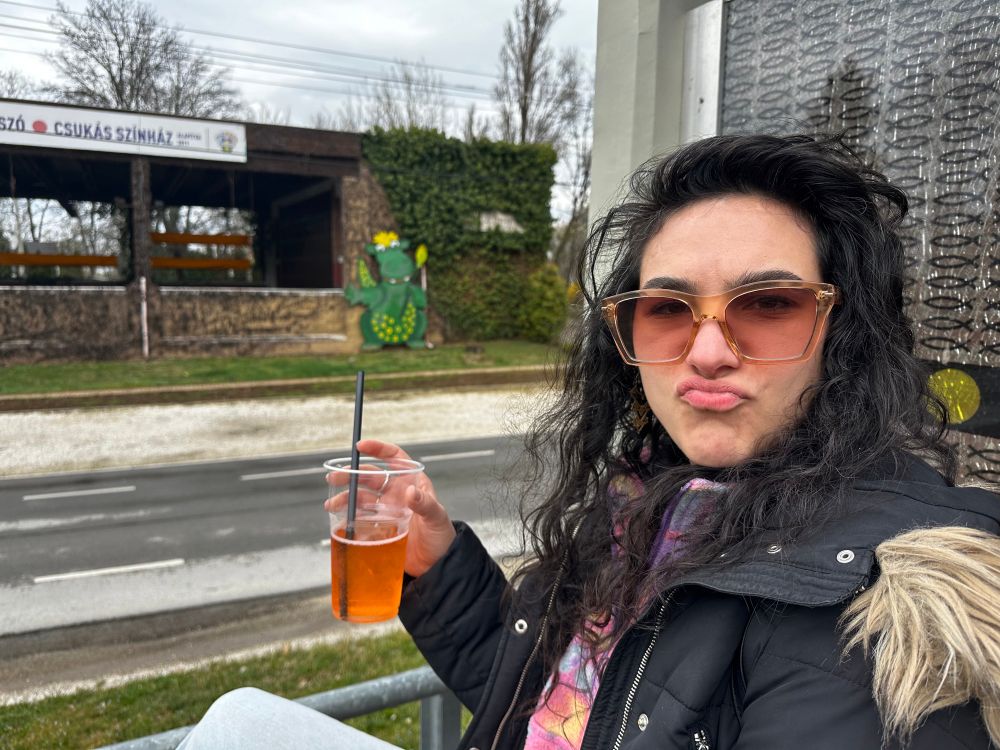 
FancyKarolina Posing with a drink in hand
