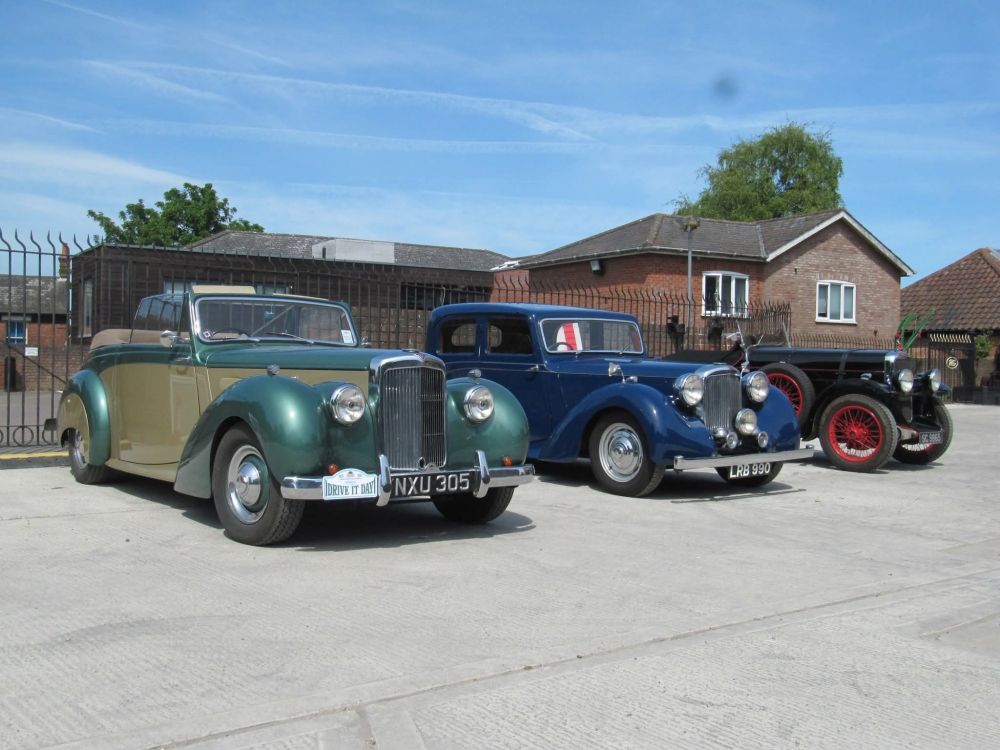 Three classic Alvis motor cars gracing the car park at the Long Shop Museum. 
