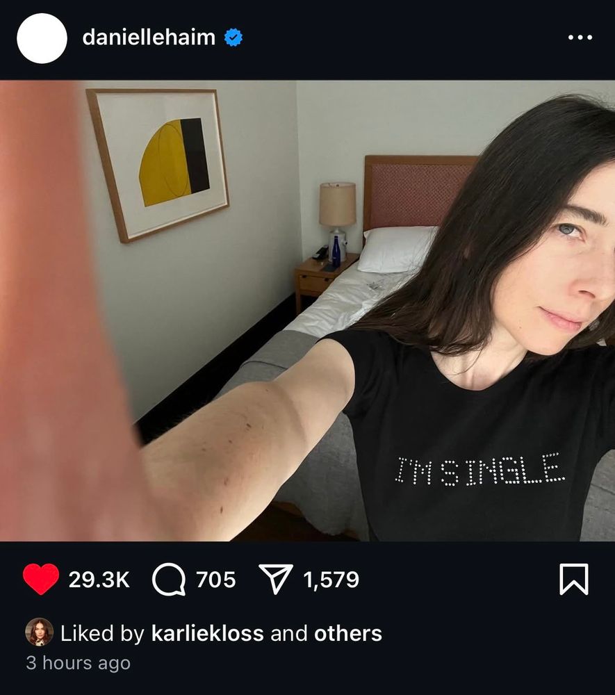 Danielle haim Insta post wearing a “I’m single” shirt