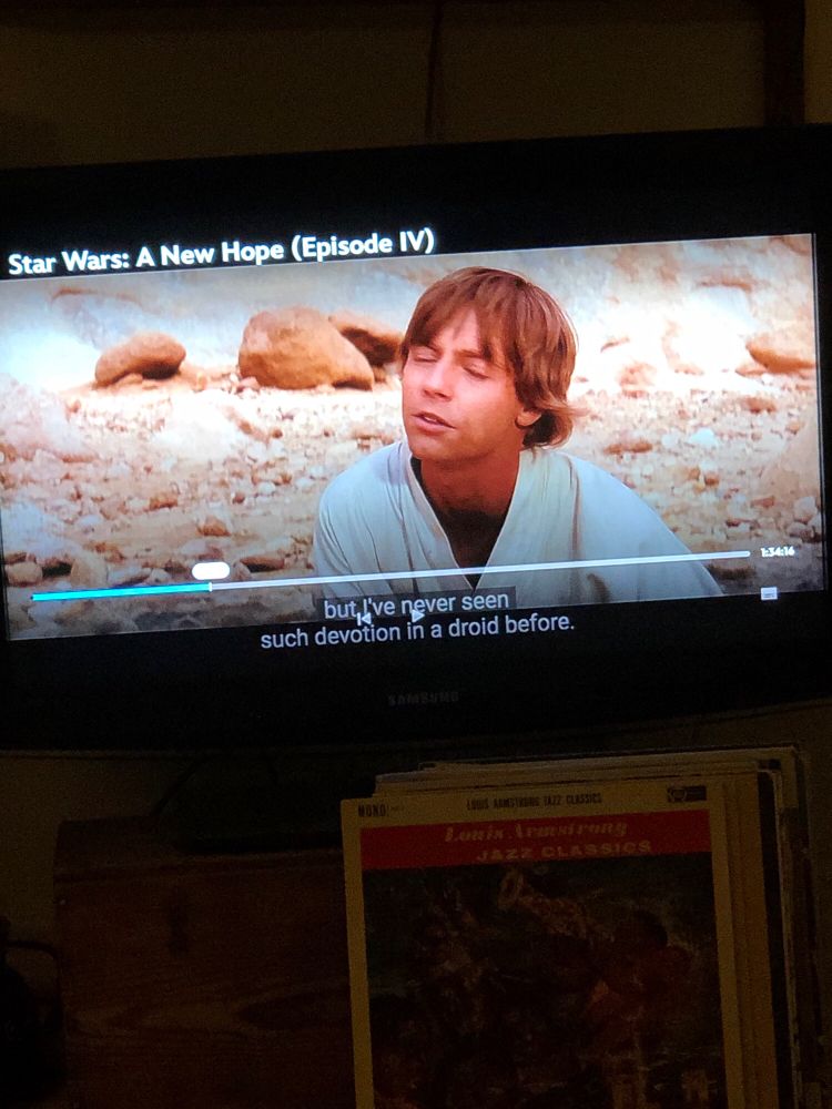An unbelievably young, twinky luke skywalker with his eyes closed