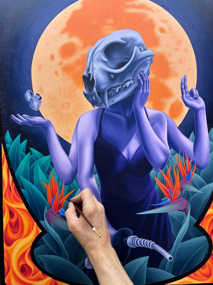 Oil painting in progress of a woman with a lynx skull for a head, with 4 arms. One hand is holding a hose from a gas pump, one hand is on her cheek, one holds up 2 fingers, one is palm up with a zippo lighter floating just above. She is surrounded by plants and bird of paradise flowers. The full moon rises behind her.
