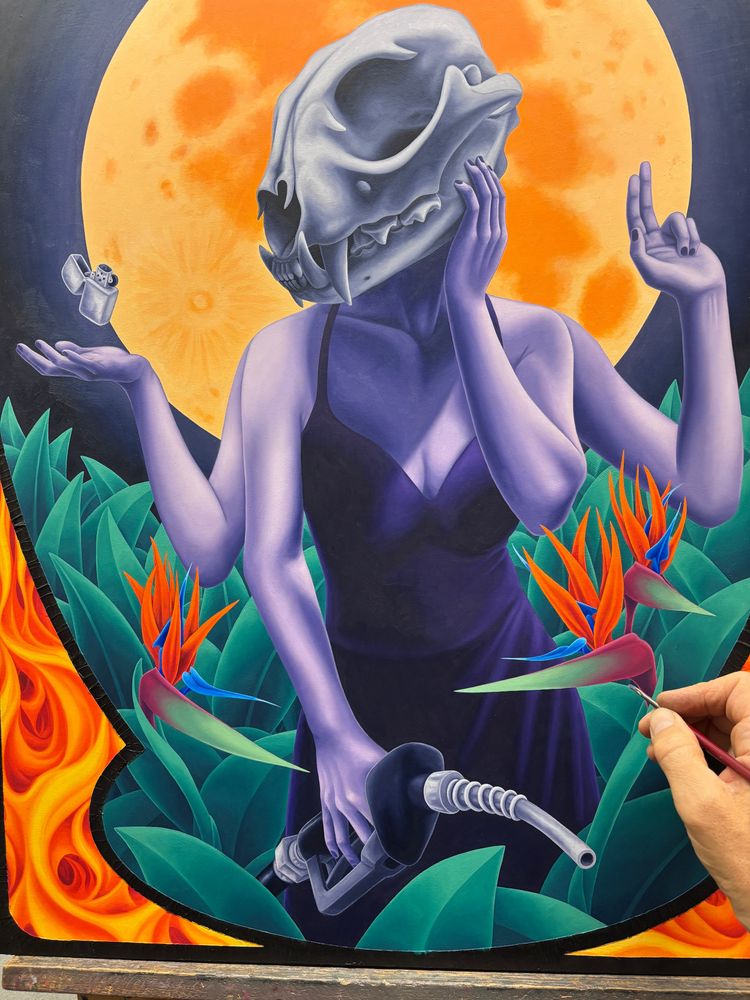 Oil painting in progress of a woman with a lynx skull for a head, with 4 arms. One hand is holding a hose from a gas pump, one hand is on her cheek, one holds up 2 fingers, one is palm up with a zippo lighter floating just above. She is surrounded by plants and bird of paradise flowers. The full moon rises behind her.