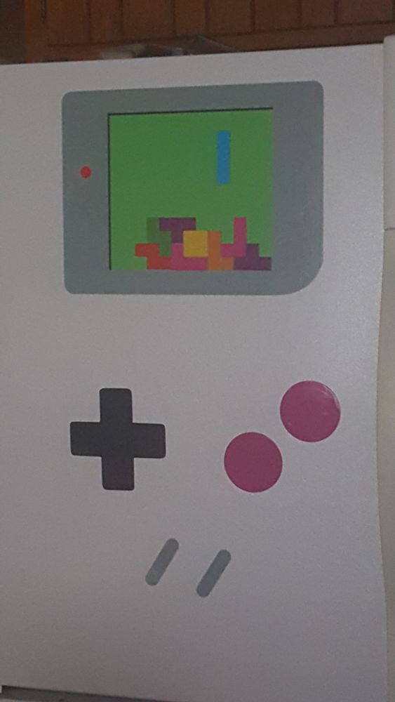 Fridge magnets that make it look like a gameboy