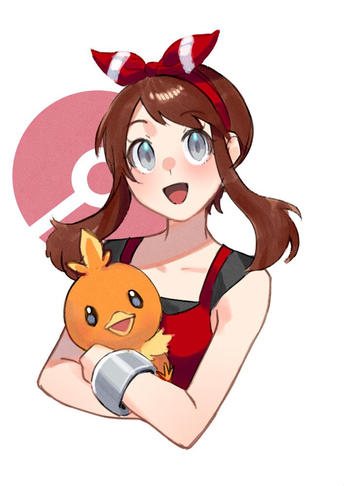 May from Pokémon holding a Torchic