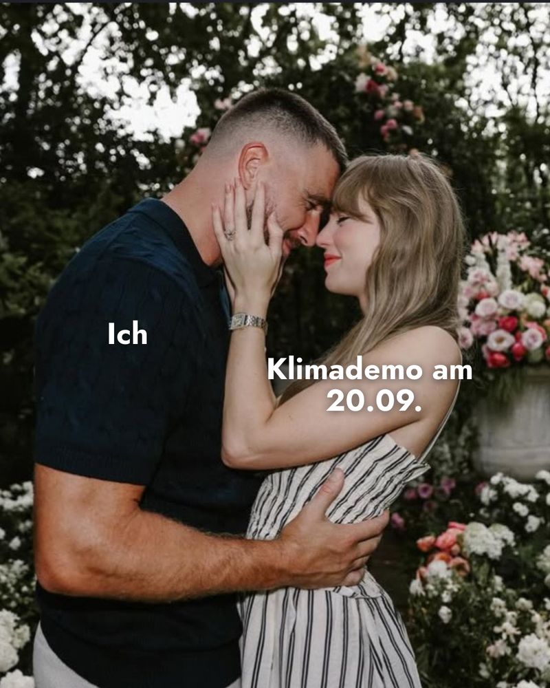 Taylor Swift und ihr Lover umarmend vor Blumen