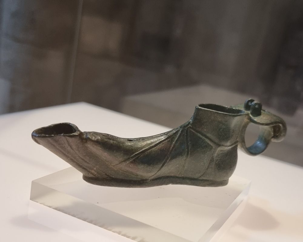 A Roman lamp in the shape of a foot