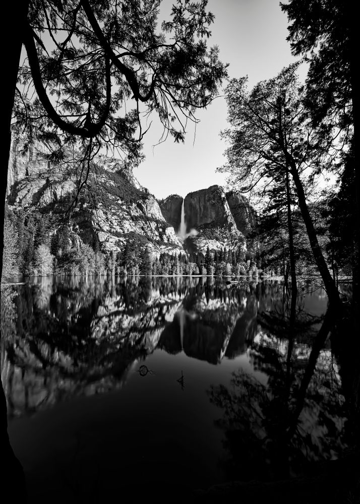 I spent 10 days in Yosemite national Park in May 2023, the year of record snow melt and floods throughout the valley.  This lake is normally a meadow with the Merced River flowing through it, but everything was flooded that spring in the river decided to take over the meadow, resulting in a beautiful reflecting pond!
