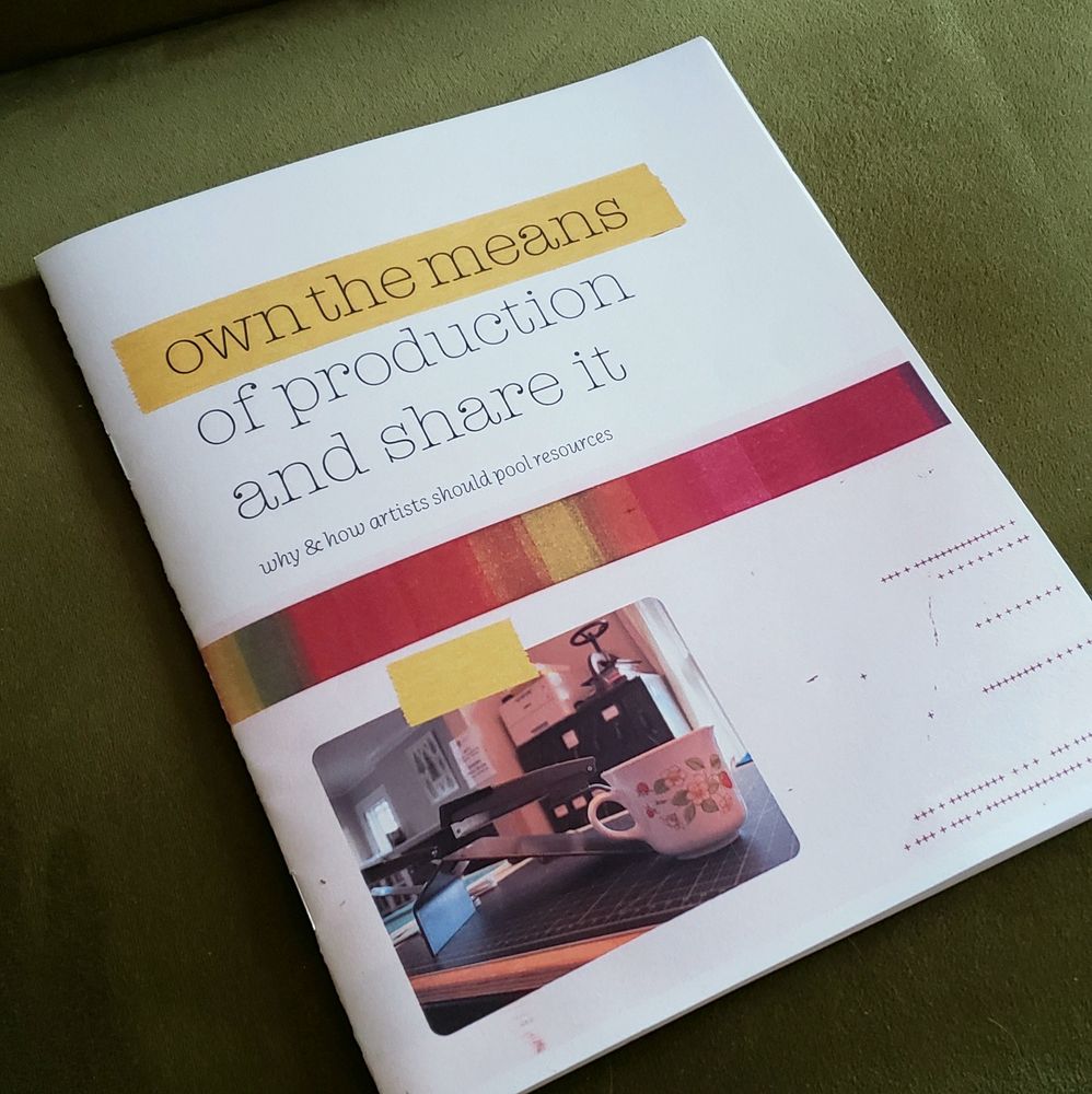 "own the means of production and share it: why and how artists should pool resources" cover of full color zine with yellow and red bars and a workspace photo